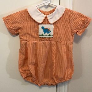 Smocked gingham dinosaur romper